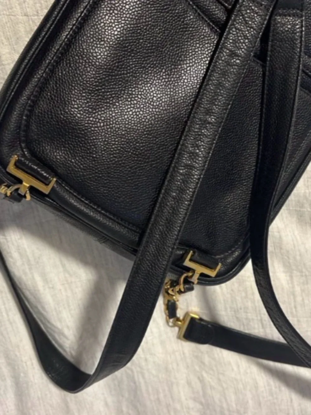 Authentic Chanel Black Caviar Leather Backpack with Gold CC Twist Lock